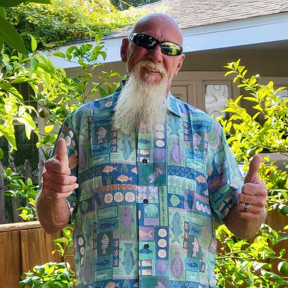A man wearing the Inland Fish Floridian Shirt by Okihasi.