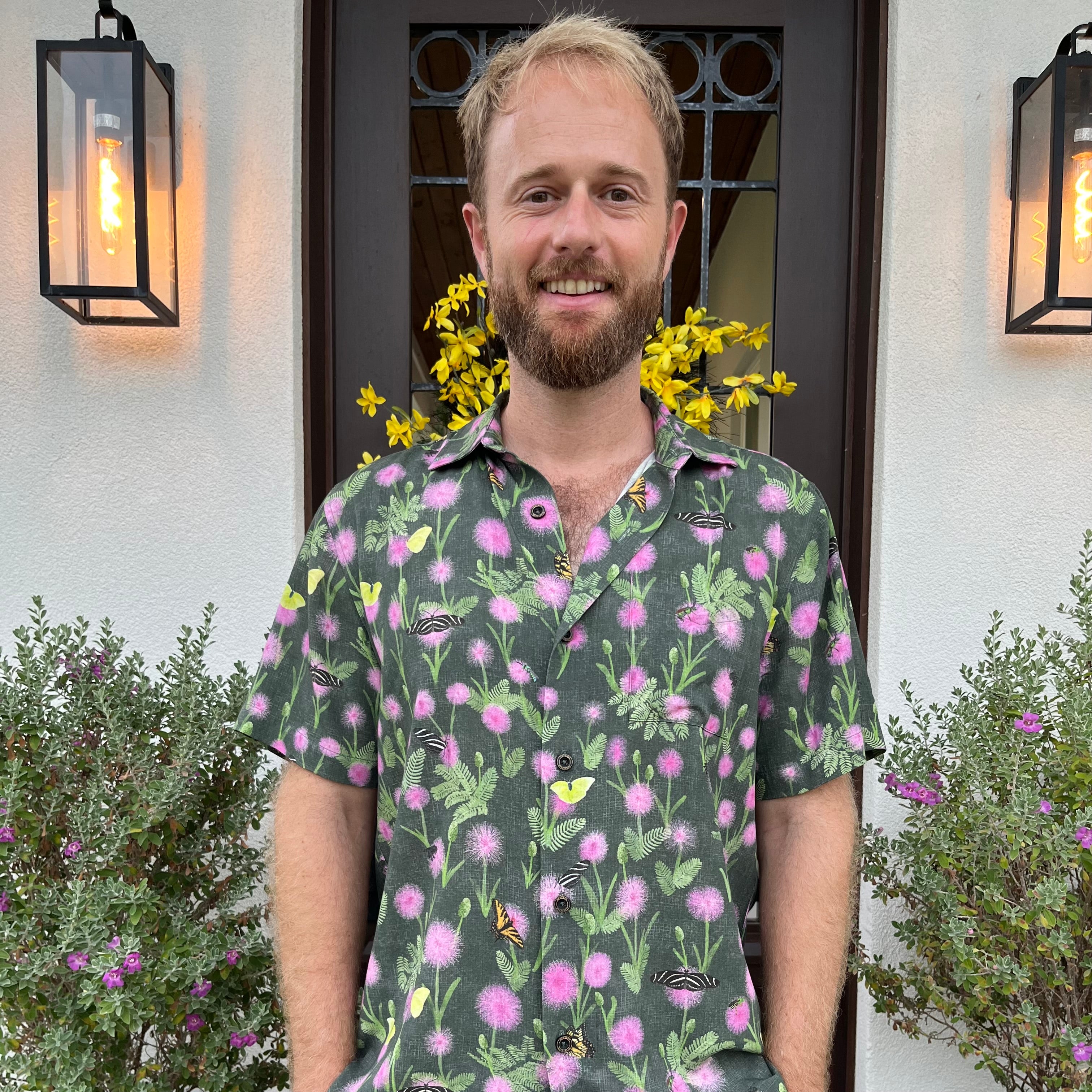 A man wearing the Sunshine Mimosa Floridian Shirt by Okihasi.