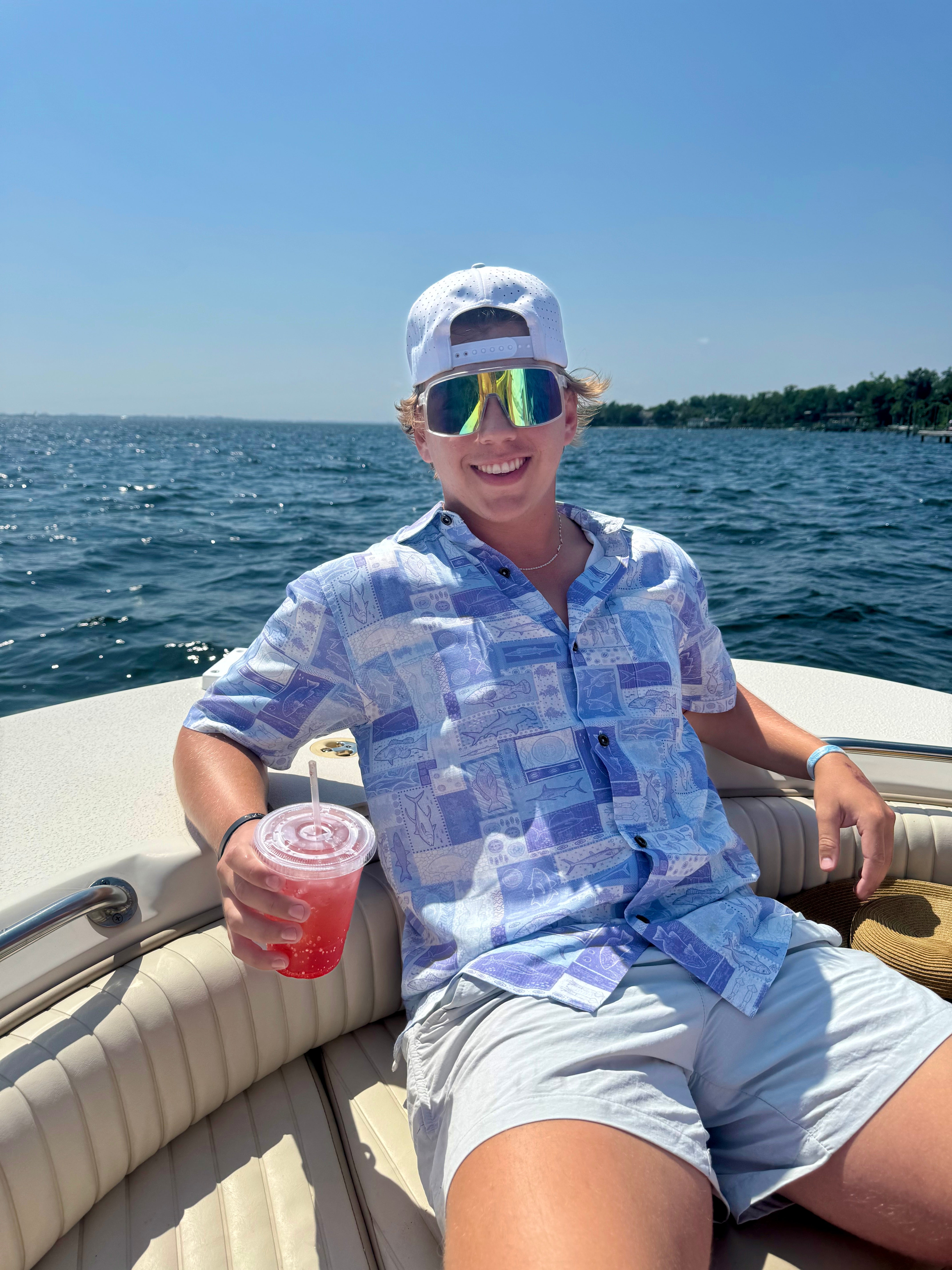 A man wearing the Offshore Fish Floridian Shirt by Okihasi.