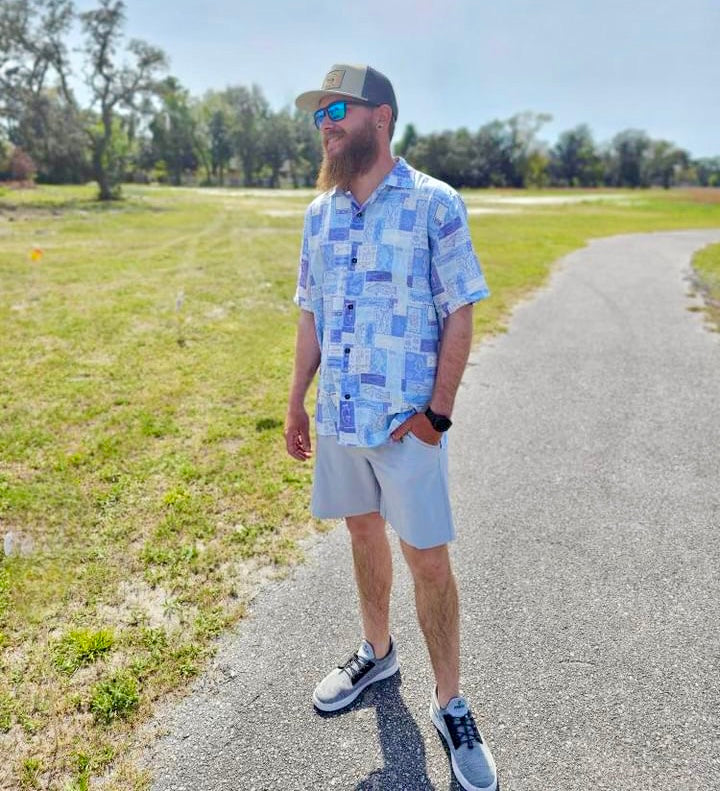 A man wearing the Offshore Fish Floridian Shirt by Okihasi.