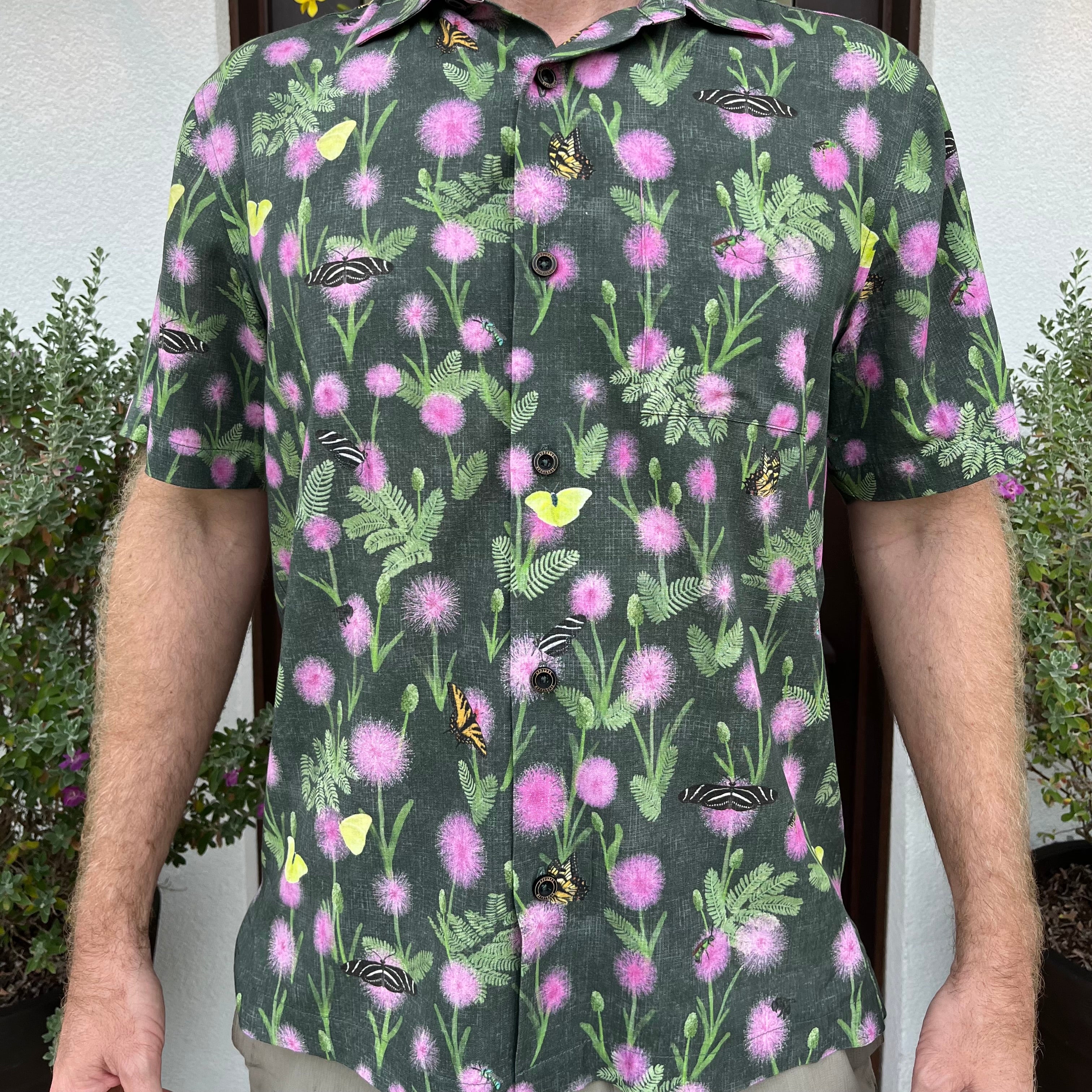 A man wearing the Sunshine Mimosa Floridian Shirt by Okihasi.