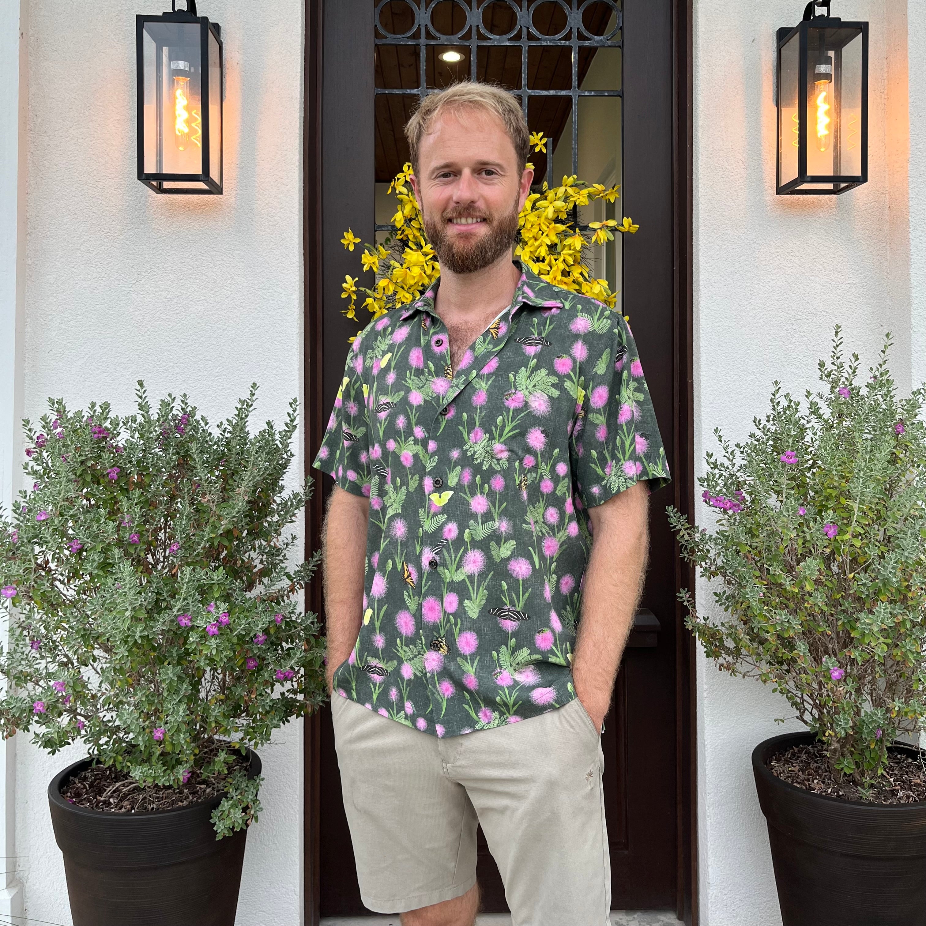 A man wearing the Sunshine Mimosa Floridian Shirt by Okihasi.