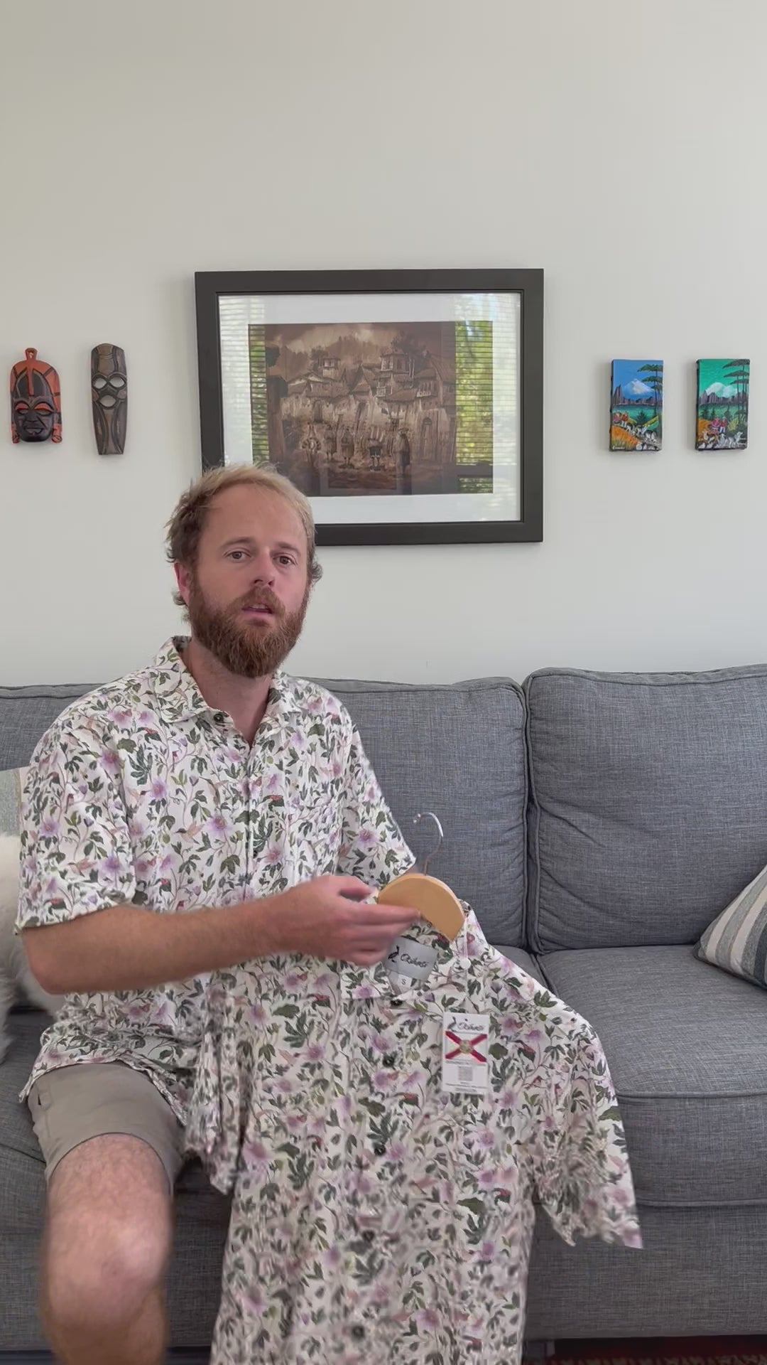 A video of a man explaining the details of the Passionflower Floridian Shirt by Okihasi.